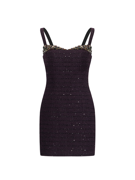 Fitted mini dress with shimmering embellishments, delicate straps, and a structured silhouette. Made from 85% polyester, 15% wool, and lined with 100% polyester