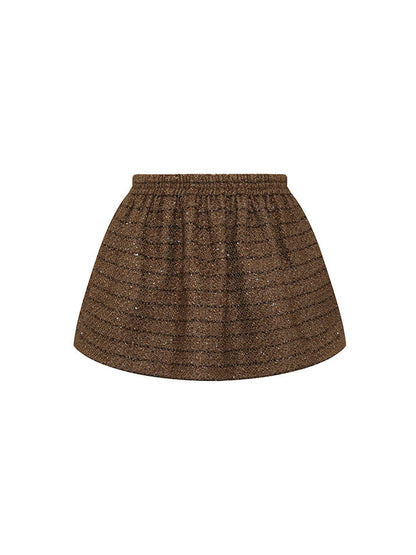 A-line wool-blend mini skirt with shimmer detailing, an elastic waistband, and a flattering high-waisted design. Made from 94.3% polyester, 5.7% wool, and lined with 100% polyester