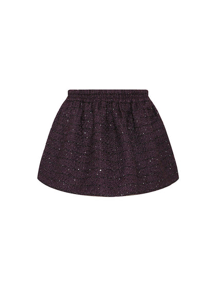 A-line wool-blend mini skirt with shimmer detailing, an elastic waistband, and a flattering high-waisted design. Made from 94.3% polyester, 5.7% wool, and lined with 100% polyester