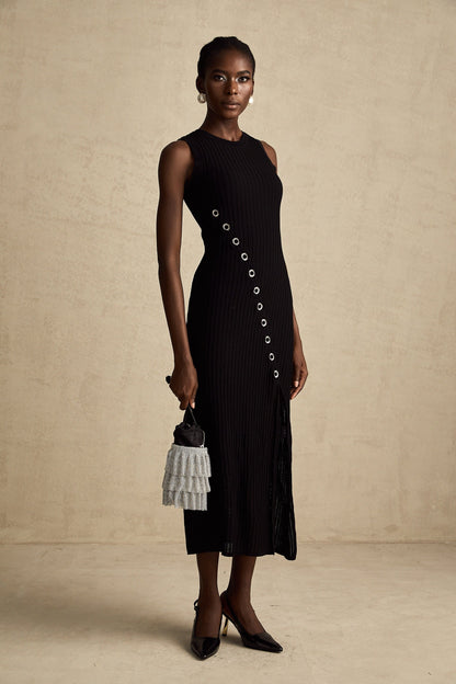 A black knitted midi dress with hoop embellishments