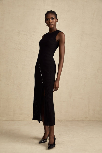 A black knitted midi dress with hoop embellishments