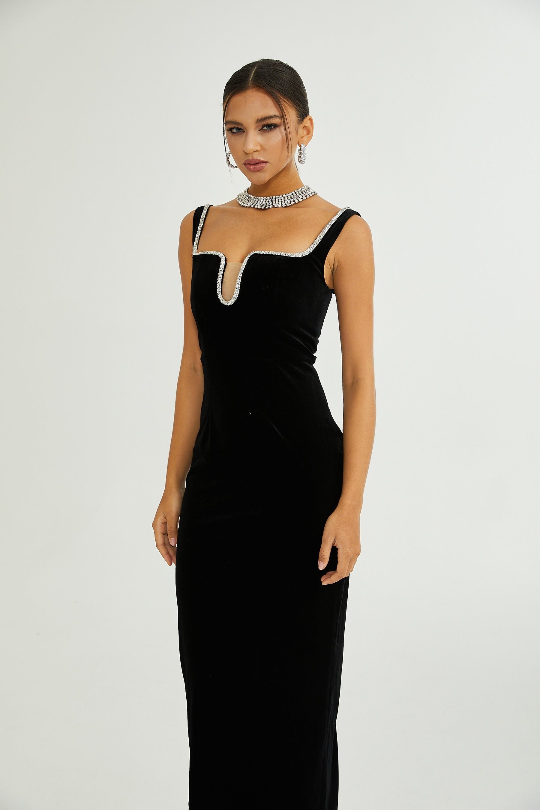 A black midi dress with a Ushaped neckline