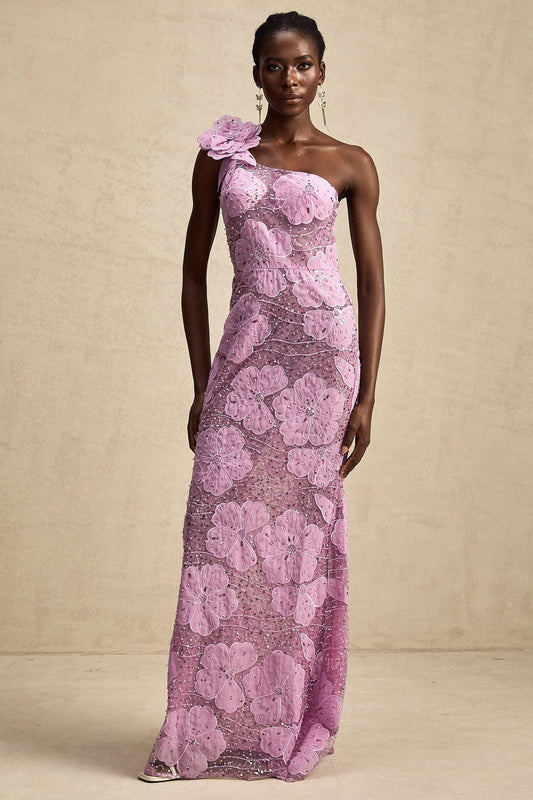 A long purple maxi dress with floral applique details