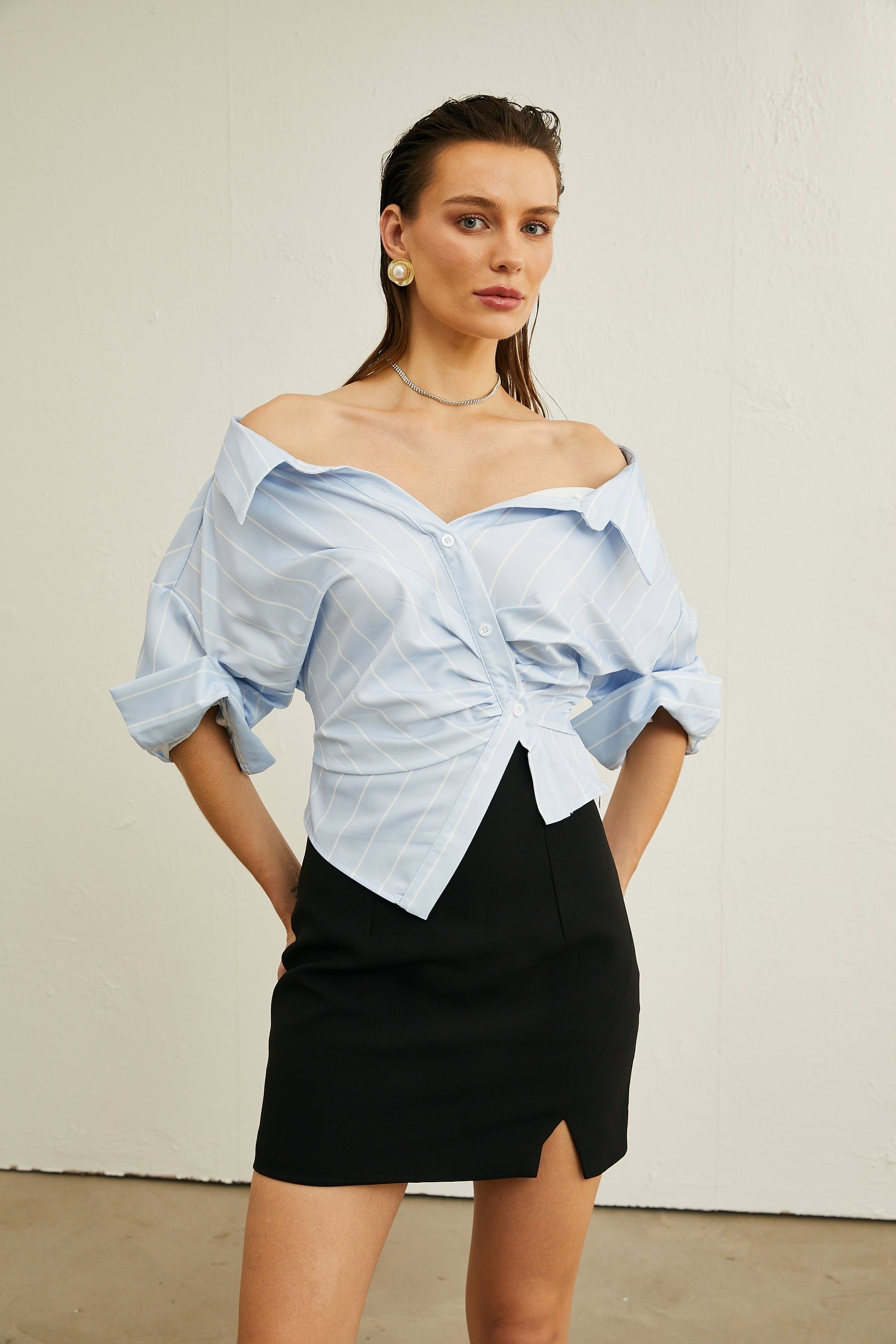 Blue and White Striped Off-Shoulder Blouse with Long Sleeves and Relaxed Fit