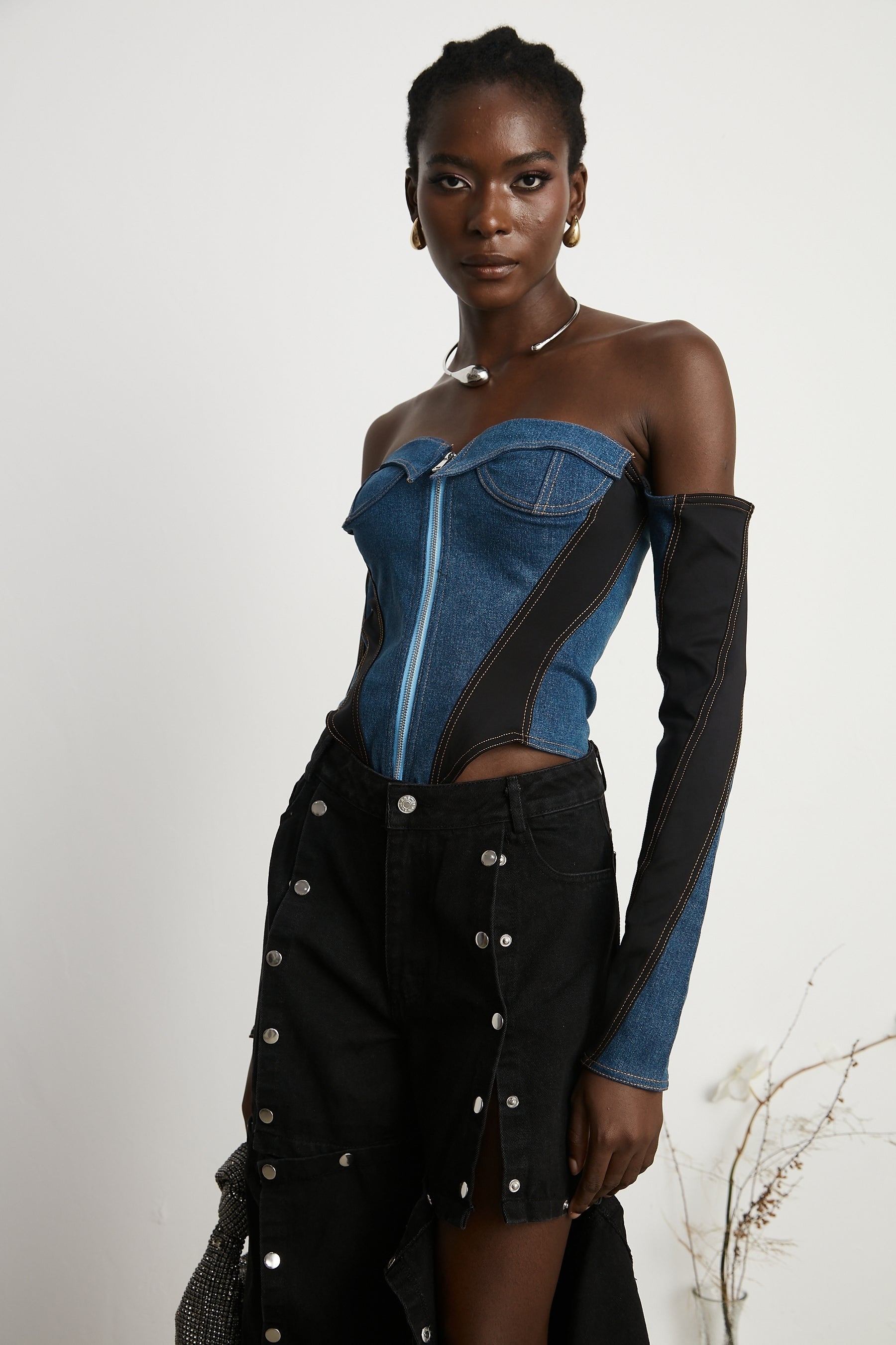 dark blue denim bodysuit with corset style top and long sleeves