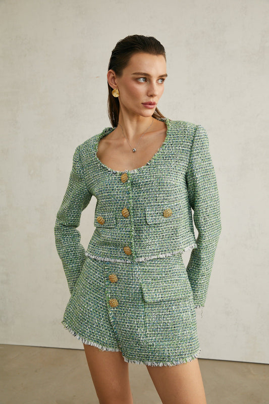 a green tweed jacket and matching shorts set