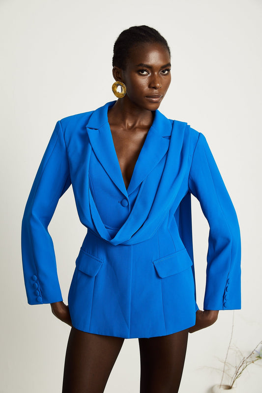 a light blue jacket with a scarflike collar detail