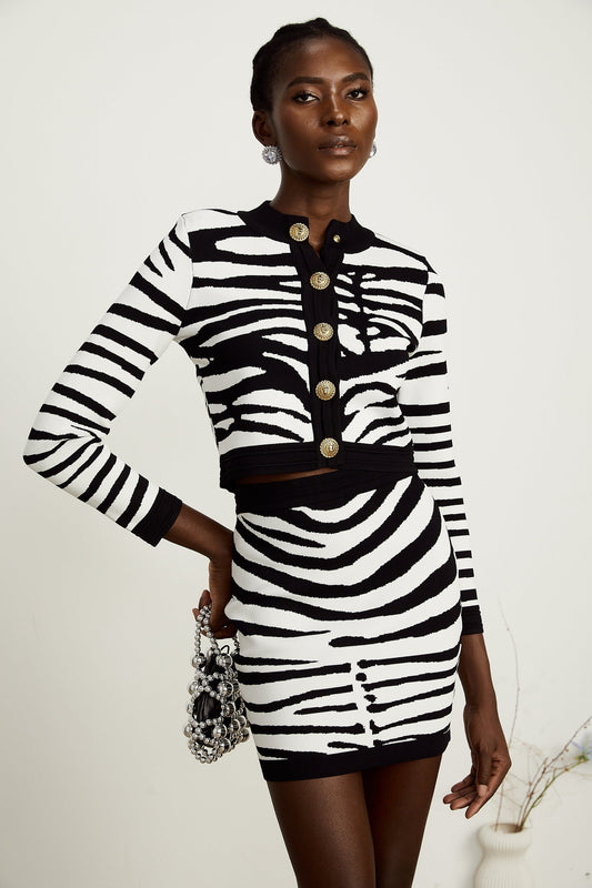 a zebraprint matching knitted cardigan and skirt set