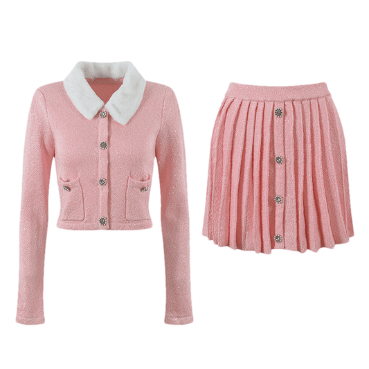 A pink jacket and matching skirt set