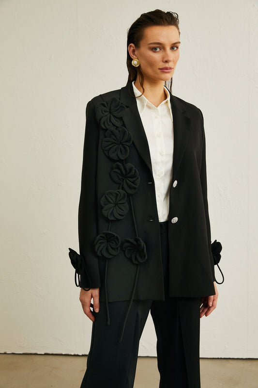 Black jacket with floral applique details