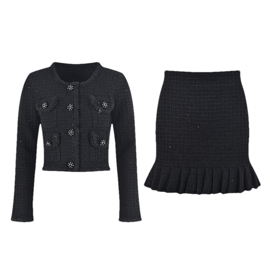 A black waffle knit matching set featuring a jacket and skirt