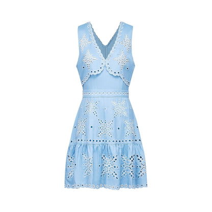 A blue and white sleeveless Vneck dress with a layered design broderie anglaise decor scallop trim and ruched detailing on a flared hem