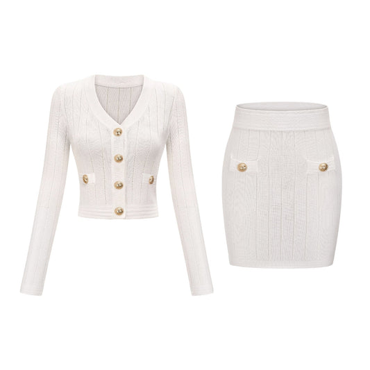 a knitted top and skirt set with button details in matching color and texture