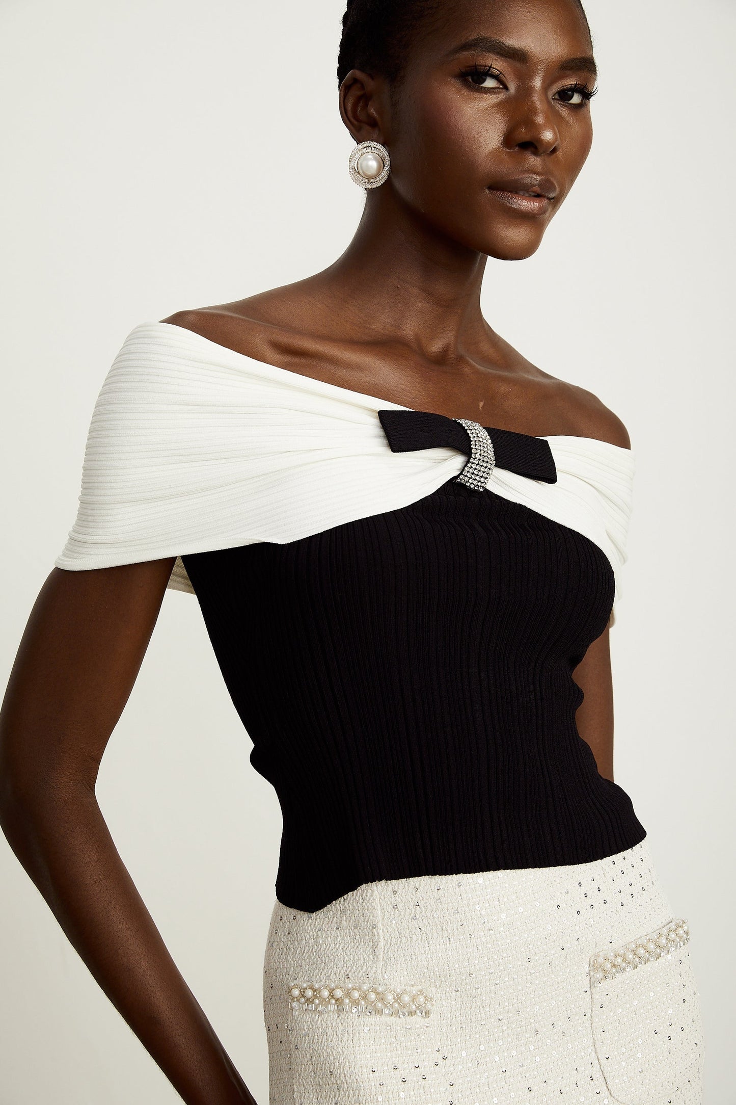 a knitted top with a bow detail