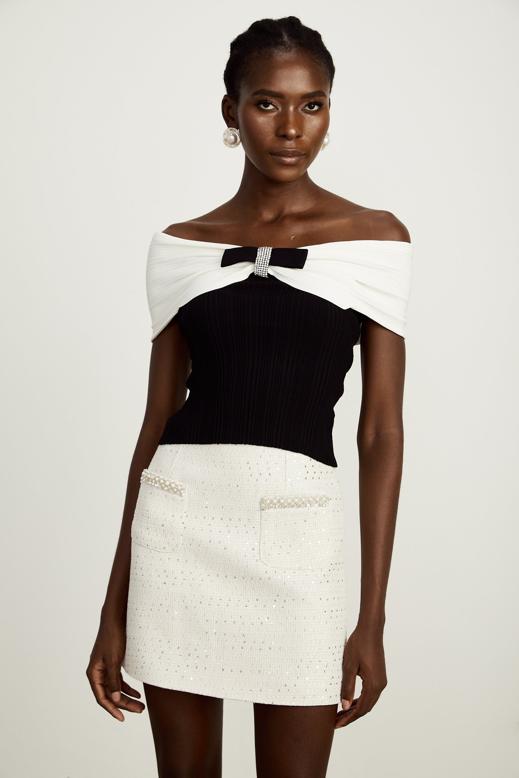 a knitted top with a bow detail