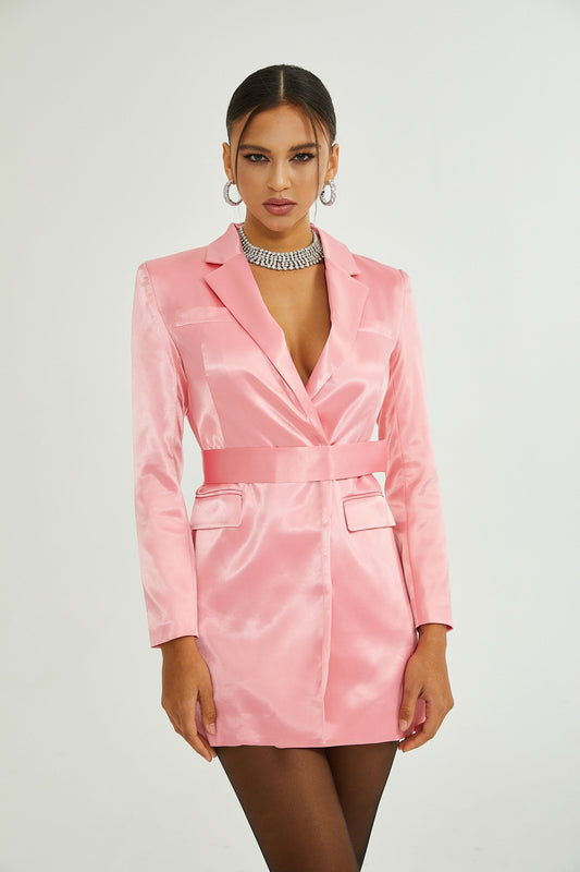 A pink satin blazer dress with a belted waist