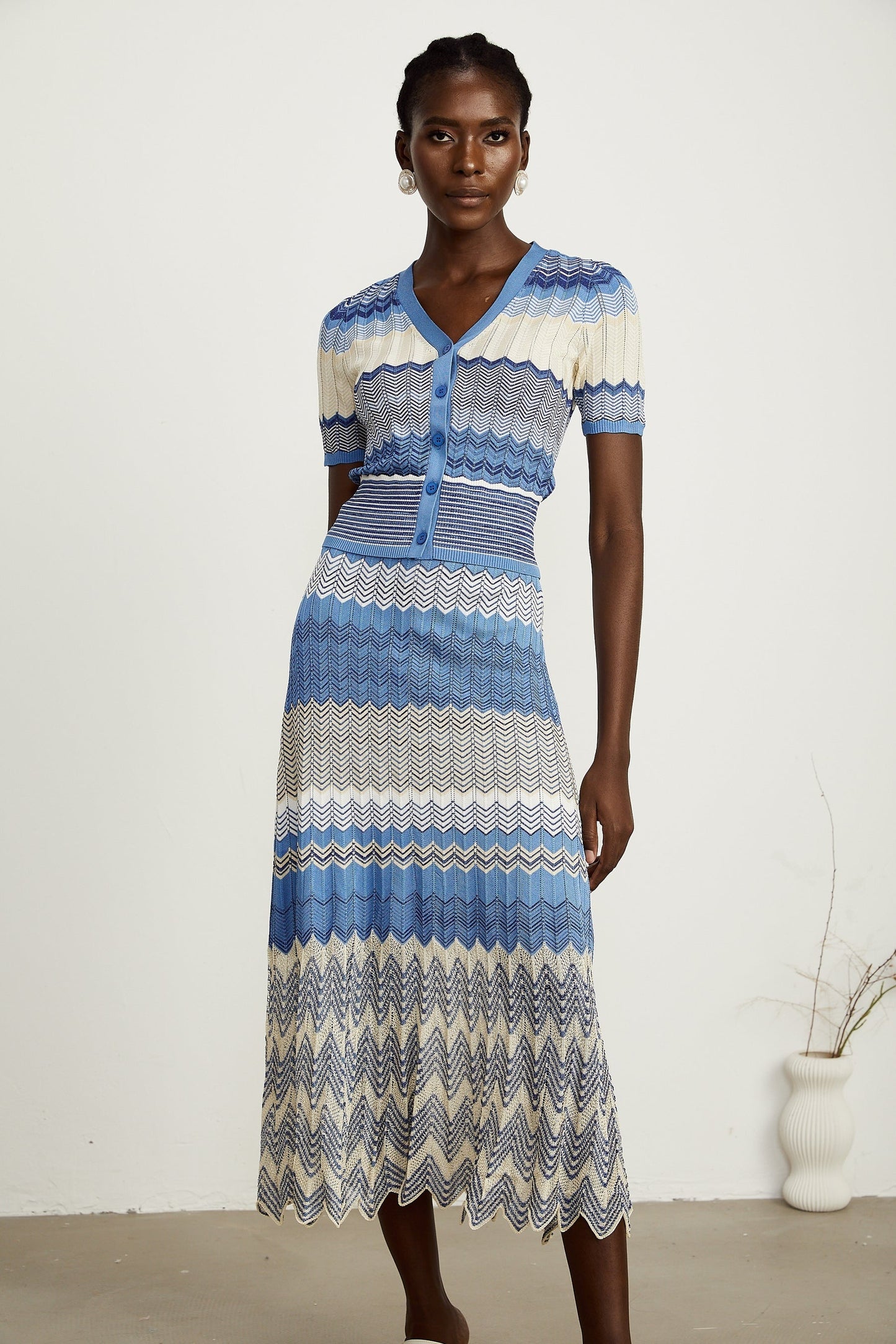 blue knit top and skirt set with zigzag pattern