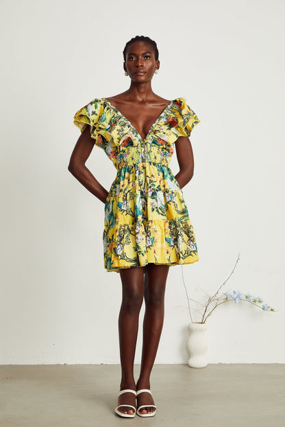 Yellow floral print mini dress with ruffled details and a short hemline